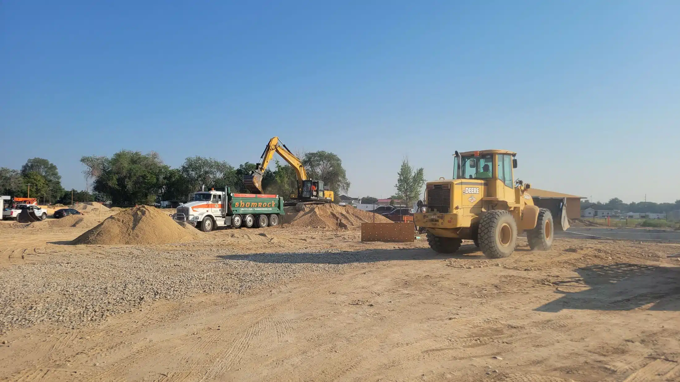 Shamrock excavator digging a residential site in the Treasure Valley
