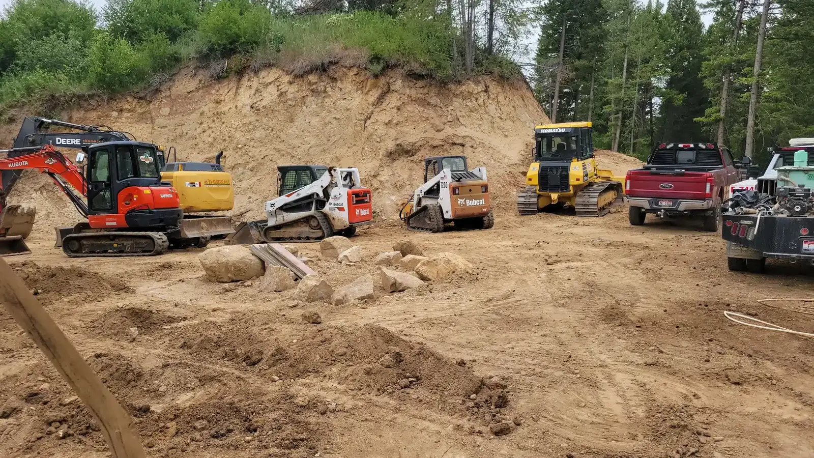 Shamrock excavator working on a graded building site near Boise, Idaho
