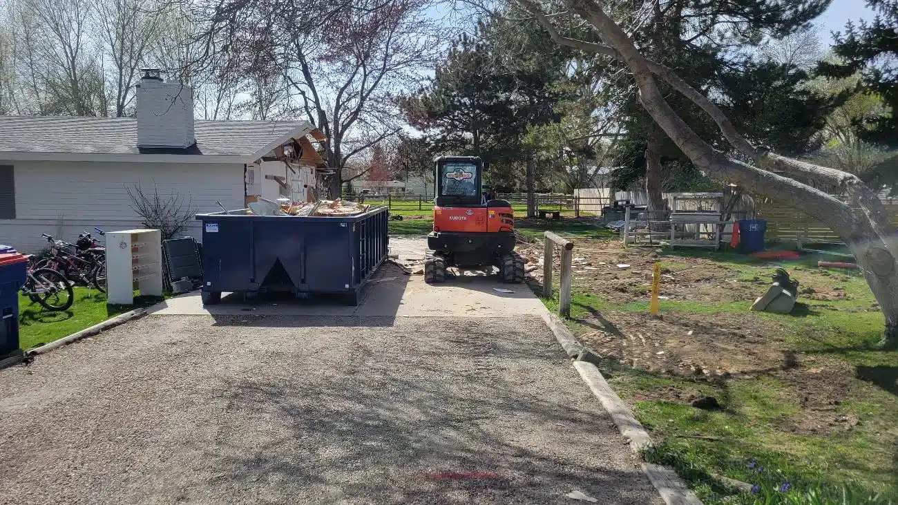 Finished drainage grading directing water away from a home near Boise